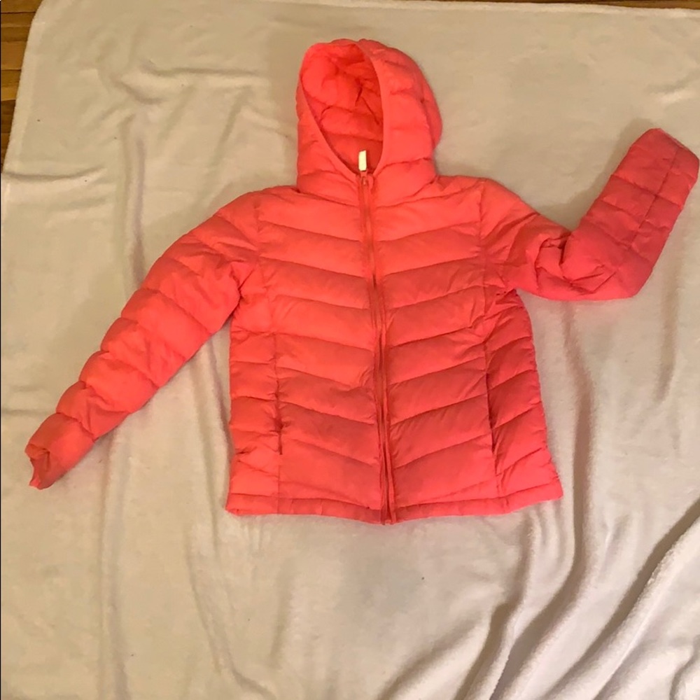 Neon pink puffer rainbow star pattern inside